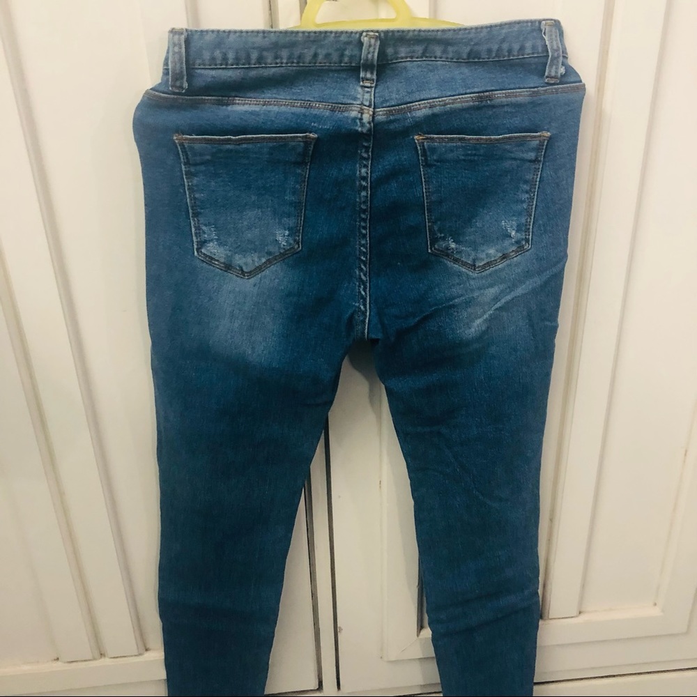 Ripped jeans - Picture 4 of 6